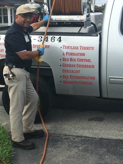 All County Environmental Services Exterminator Outside Truck
